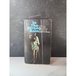 In The Wrong Rain By Robert R. Kirsch Paperback